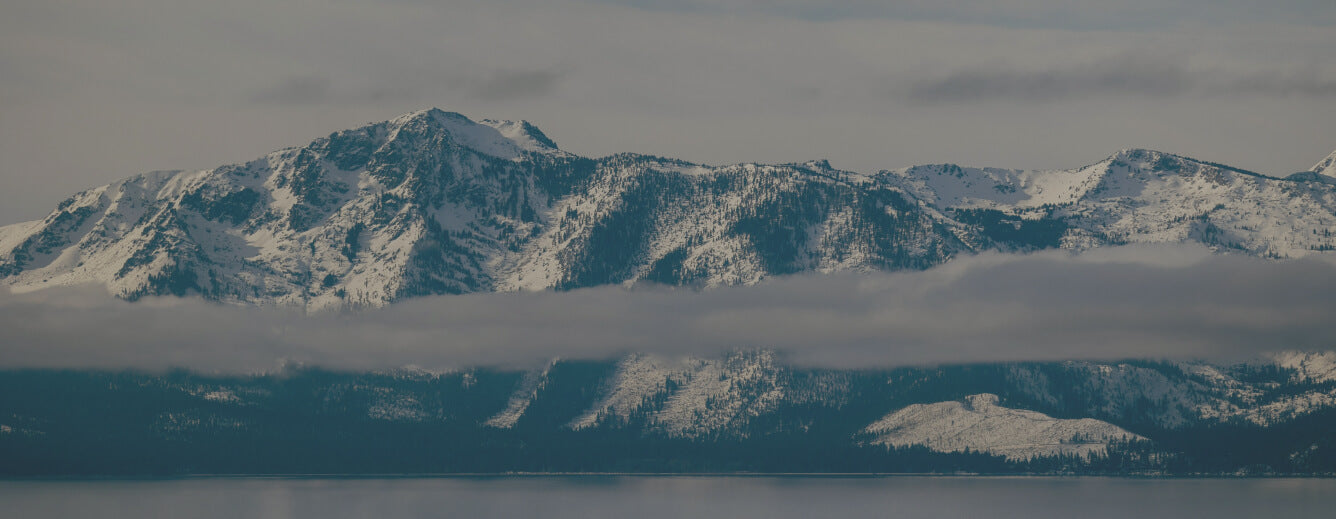 Mountains skyline with clouds rolling over